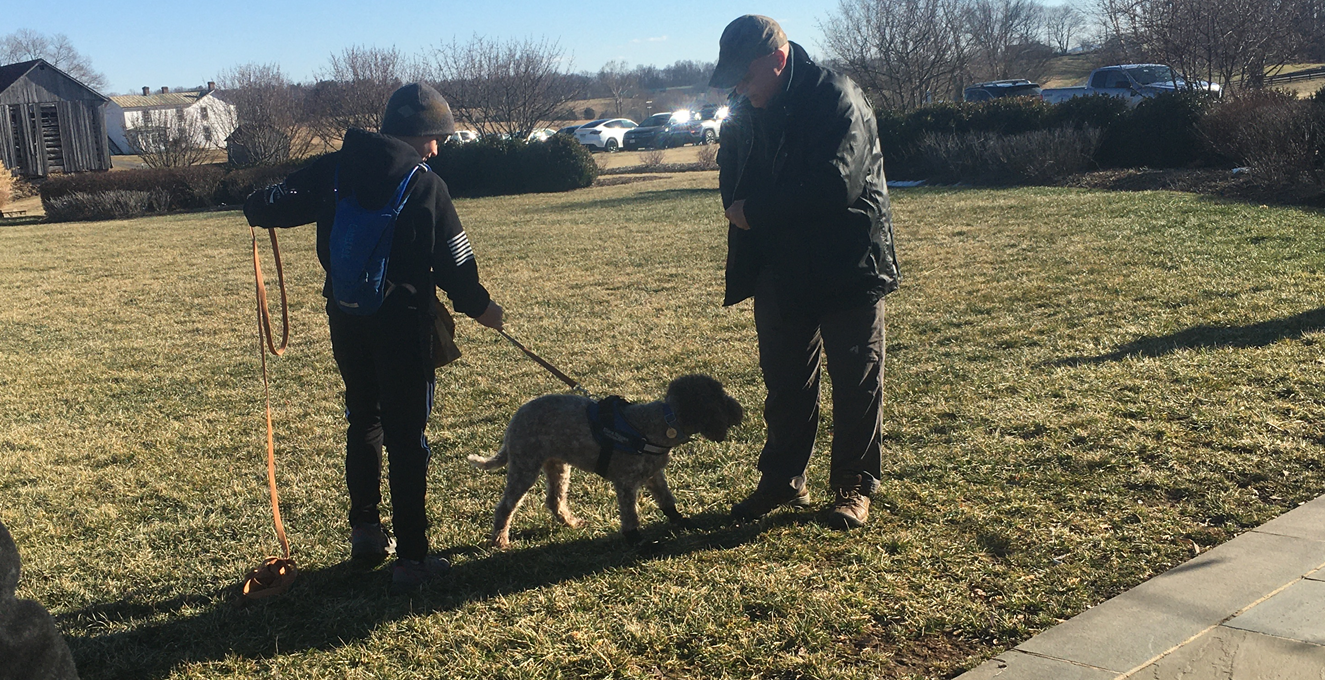 Elora with Michael Riggan and his grandson Jesse West offering a truffle hunting demo.